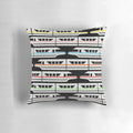 Colorful Disney-inspired pillow featuring a classic monorail design in red, yellow, blue, and green.