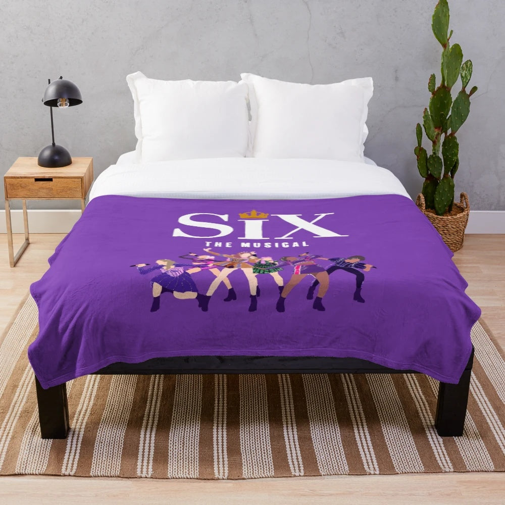 Soft and cozy plush blanket featuring the six queens from the musical Six