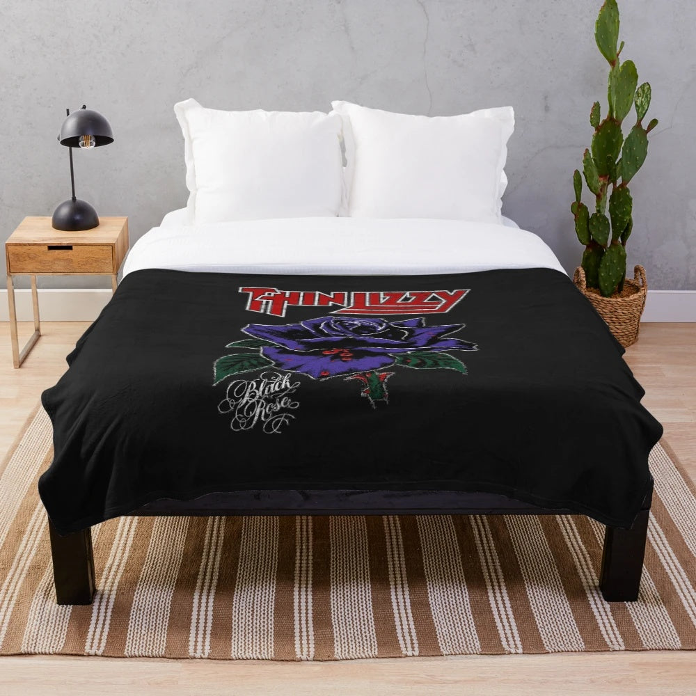 Soft, cozy plush blanket featuring the iconic Thin Lizzy logo and design