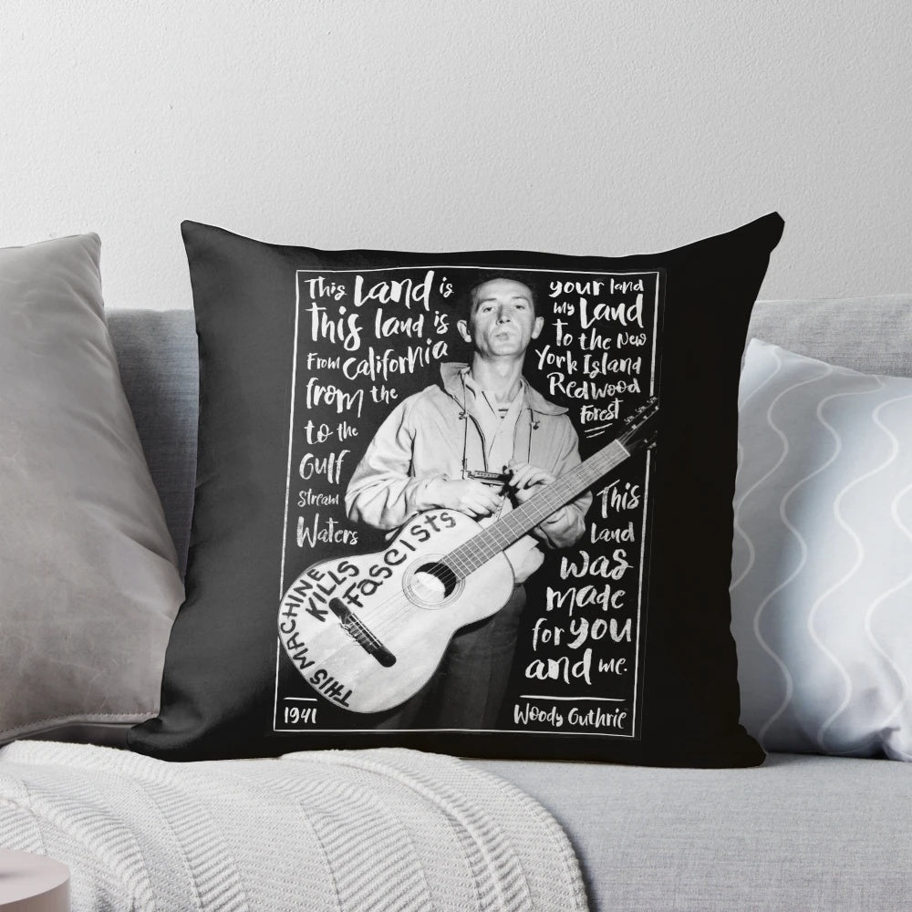 Decorative pillow featuring the lyrics and imagery of Woody Guthrie's iconic American folk song "This Land Is Your Land