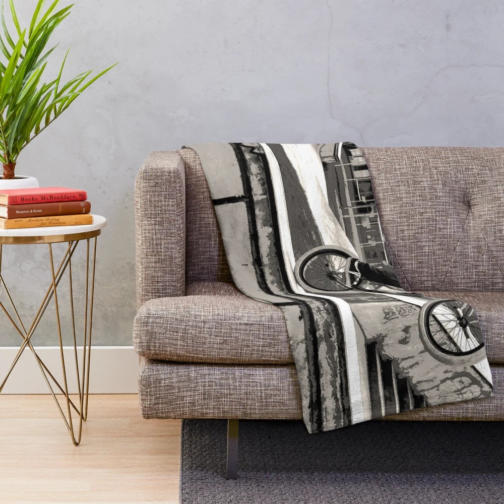 Soft and cozy plush blanket featuring a BMX-inspired design for bike lovers