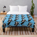 Saw-themed plush blanket with horror movie imagery