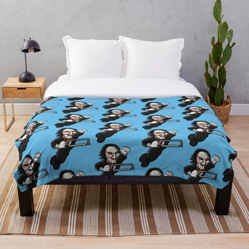 Saw-themed plush blanket with horror movie imagery
