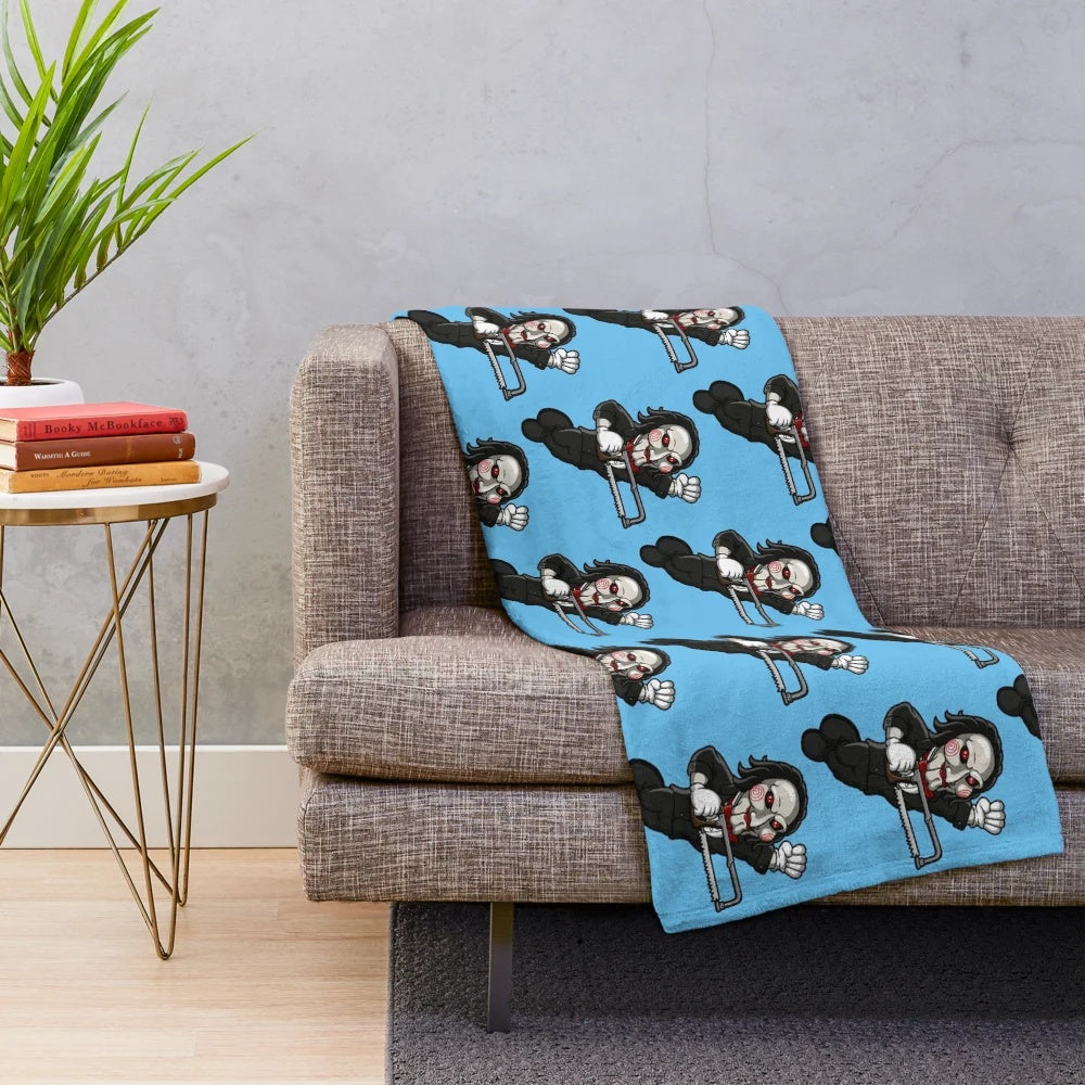 Saw-themed plush blanket with horror movie imagery