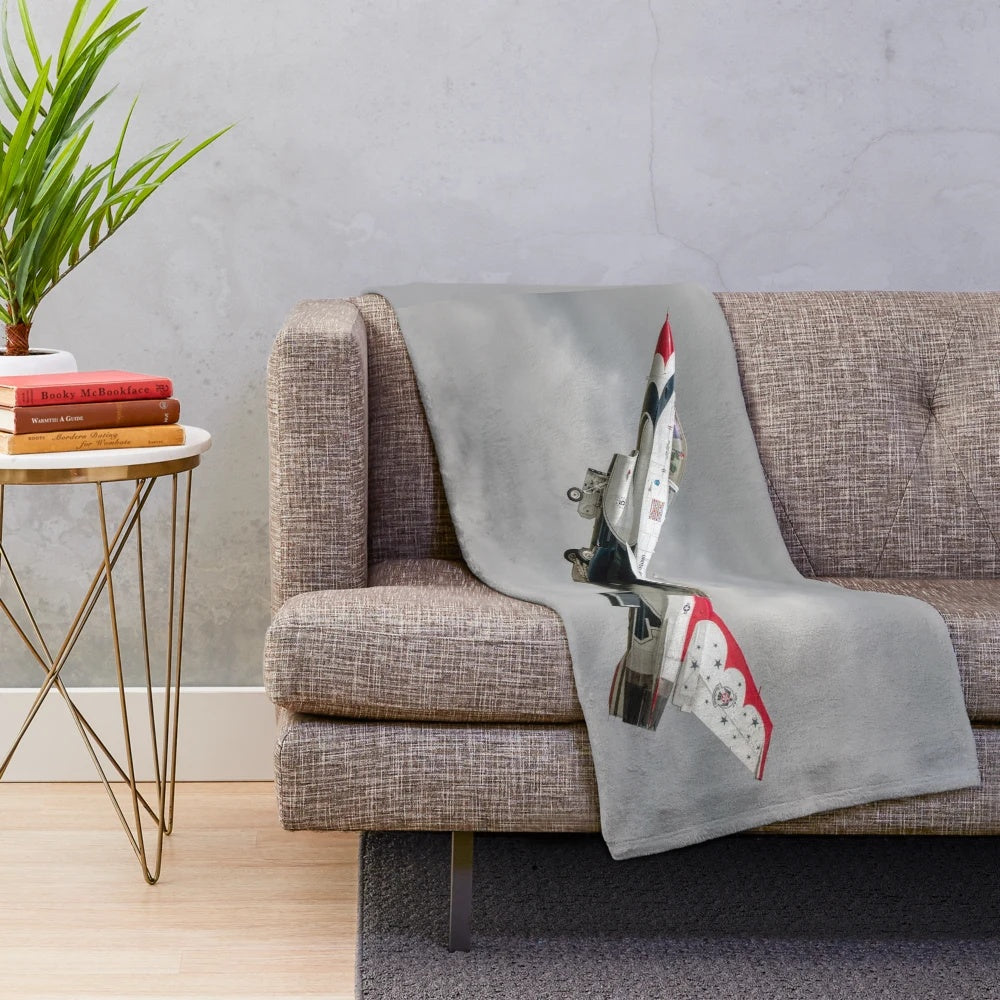 USAF Thunderbird fighter jet taking off on a plush blanket
