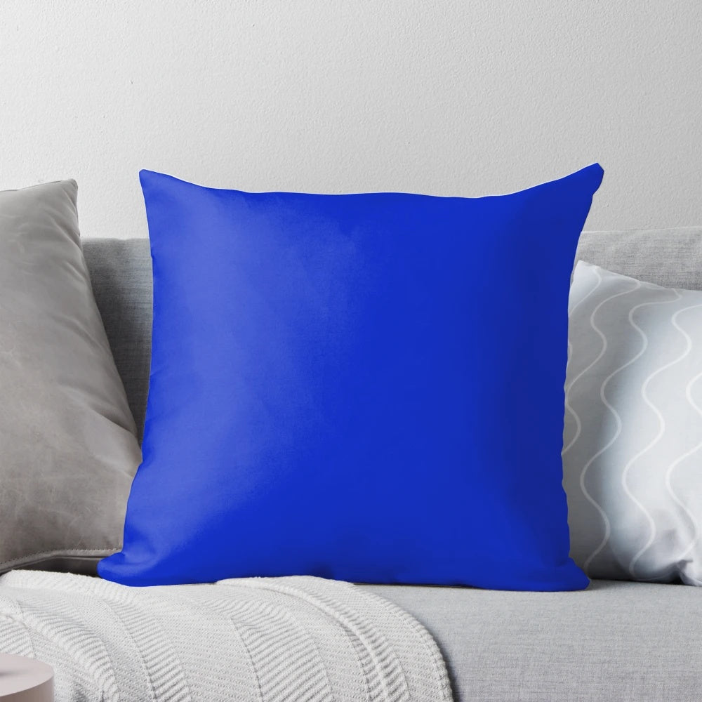 Luxurious deep blue designer pillow with a solid cobalt blue color