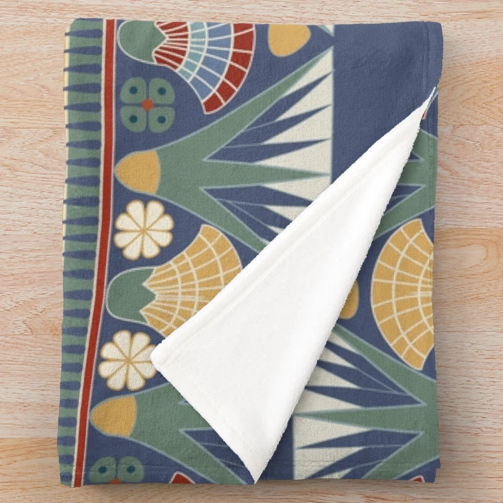 Plush blanket featuring a classic ancient Egyptian lotus flower frieze design