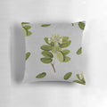 Beautifully crafted garden pillow featuring a vintage-inspired collage of vibrant flowers and lush leaves.