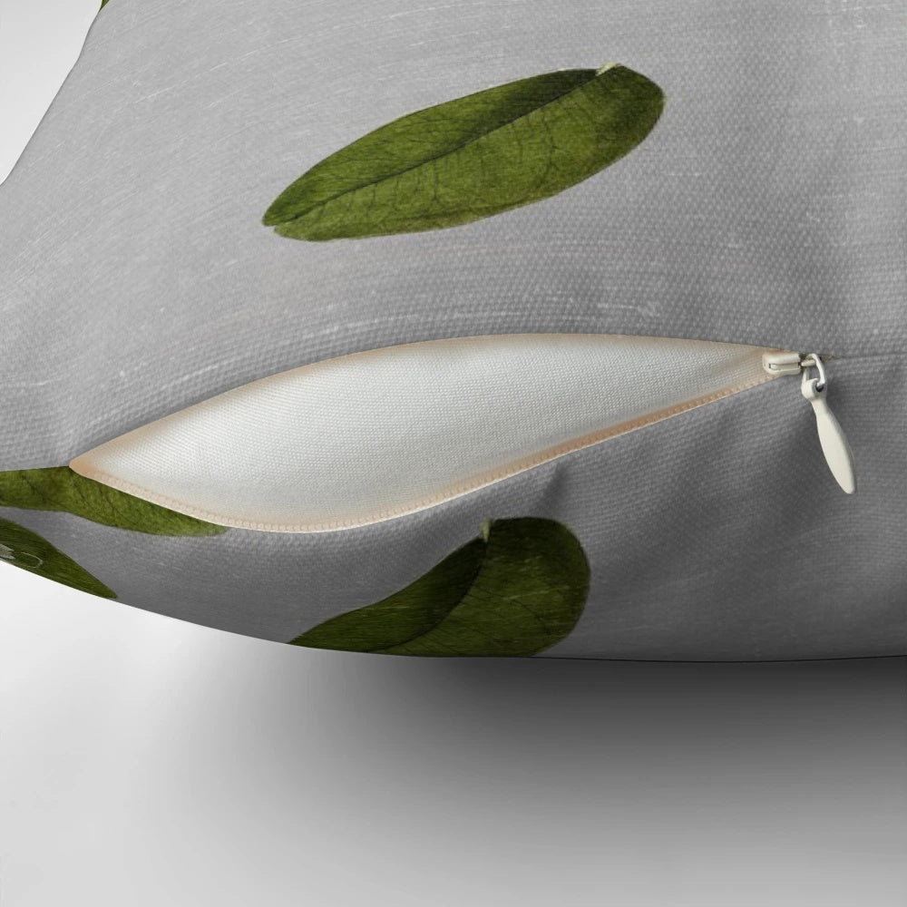 Beautifully crafted garden pillow featuring a vintage-inspired collage of vibrant flowers and lush leaves.