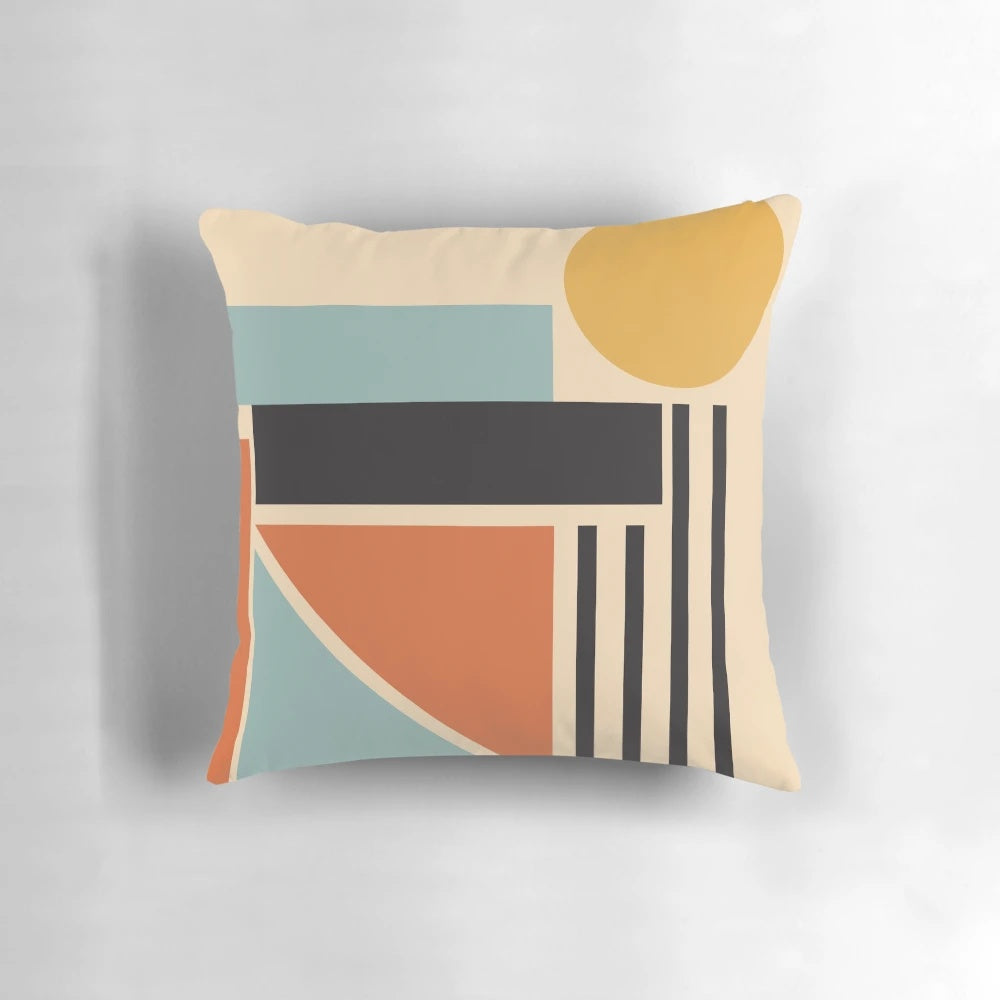 Bauhaus-inspired mid-century modern pillow with neutral geometric shapes, perfect for a minimalist summer home.