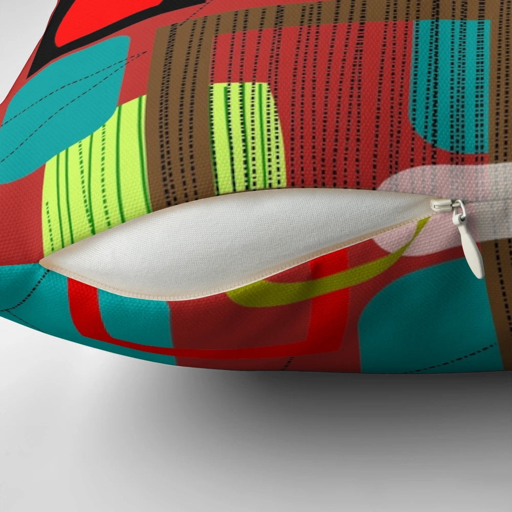 A vibrant mid-century modern abstract art pillow featuring bold colors and geometric patterns.