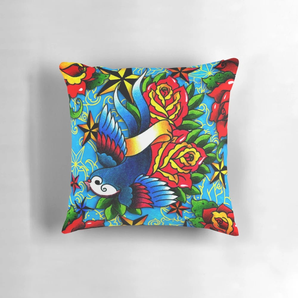 A classic tattoo-inspired throw pillow featuring a traditional swallow and rose design.