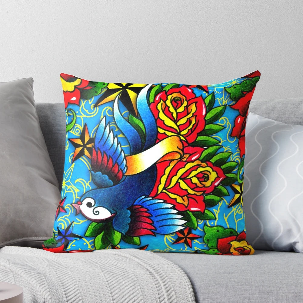 A classic tattoo-inspired throw pillow featuring a traditional swallow and rose design.
