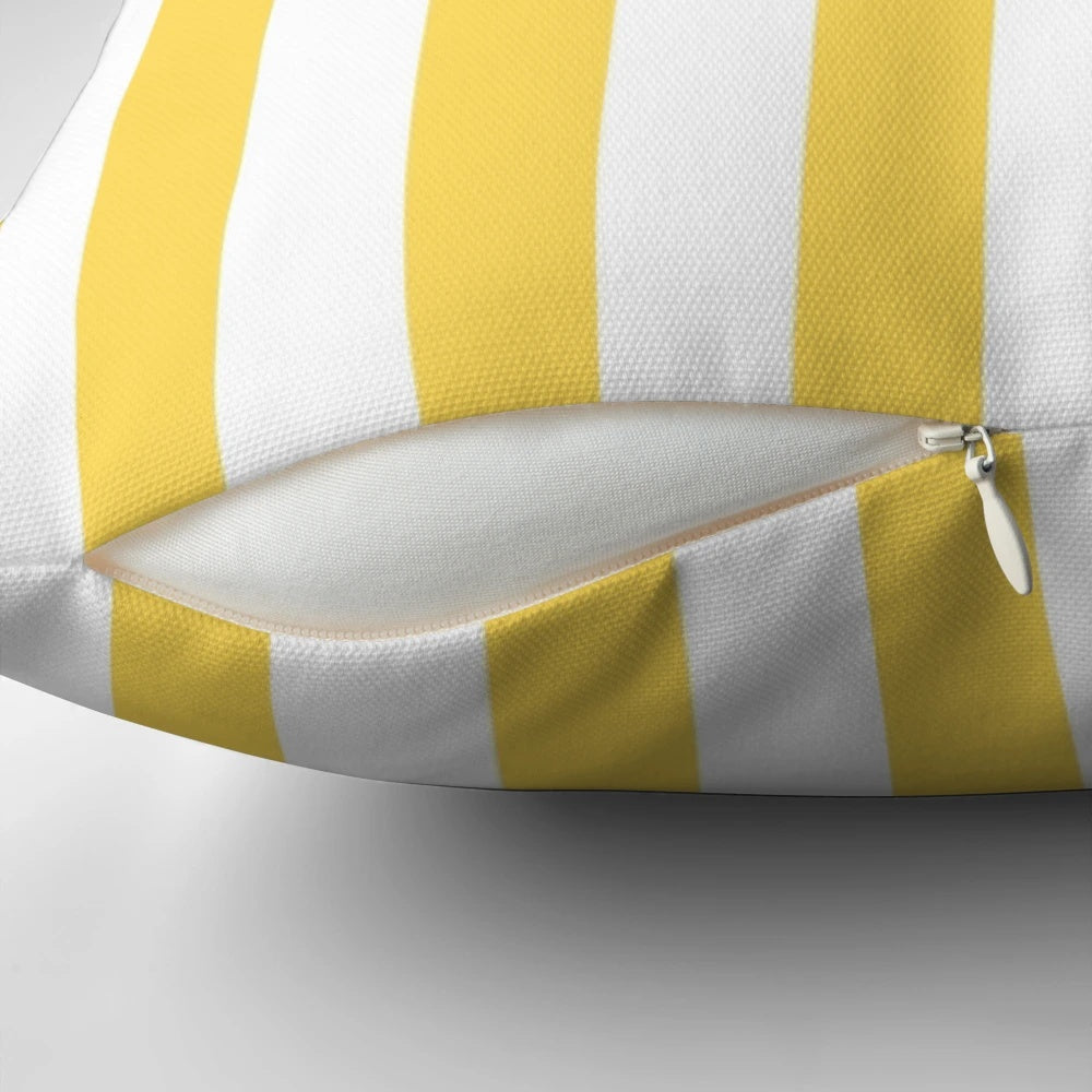 Yellow and white vertical stripe patterned decorative pillow