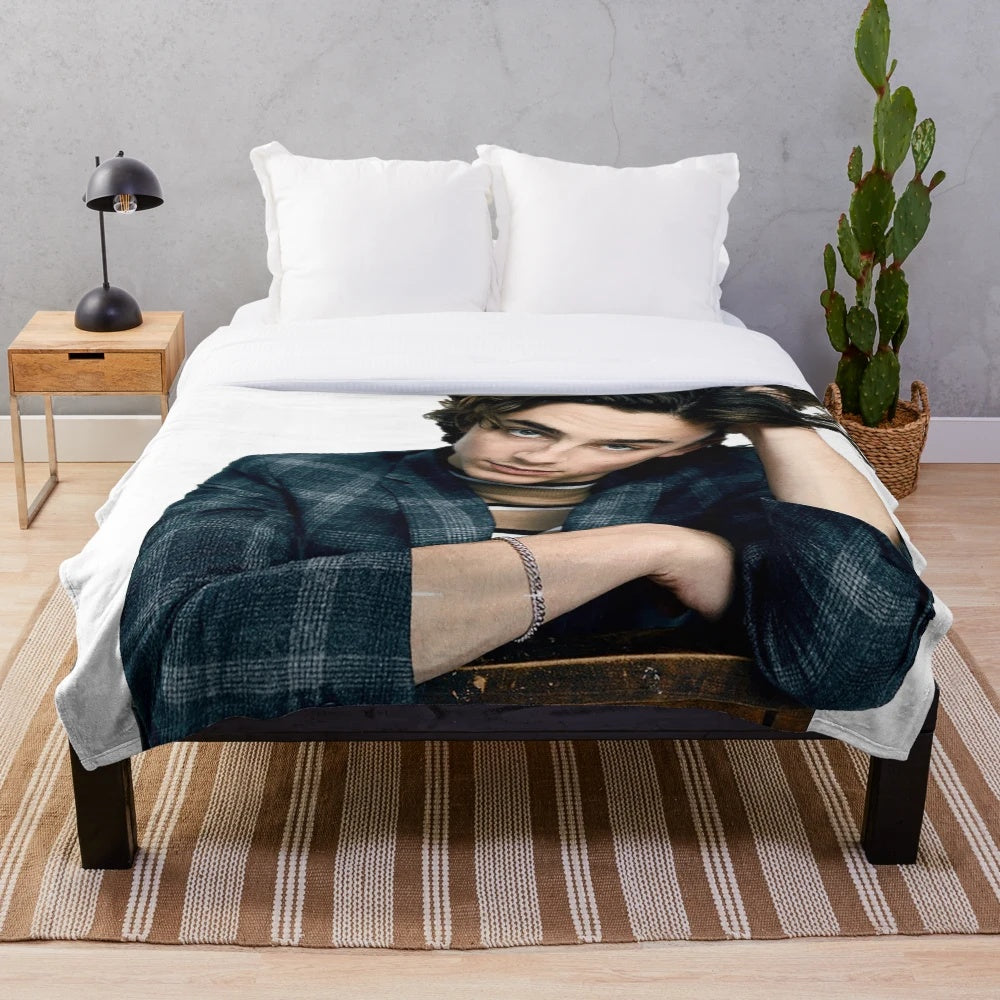 Timothée Chalamet plush blanket featuring scenes from Call Me By Your Name and Lady Bird