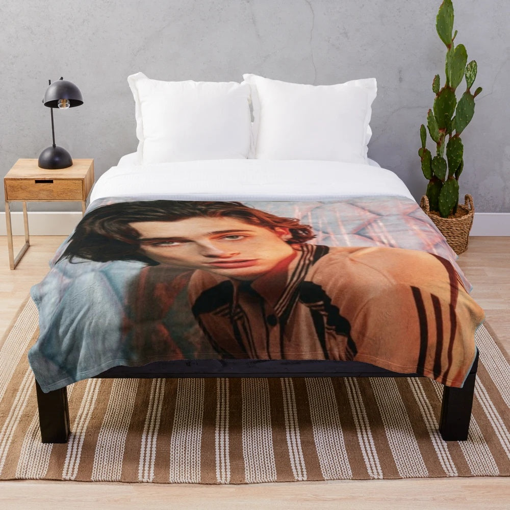 Soft and cozy plush blanket featuring the image of actor Timothee Chalamet