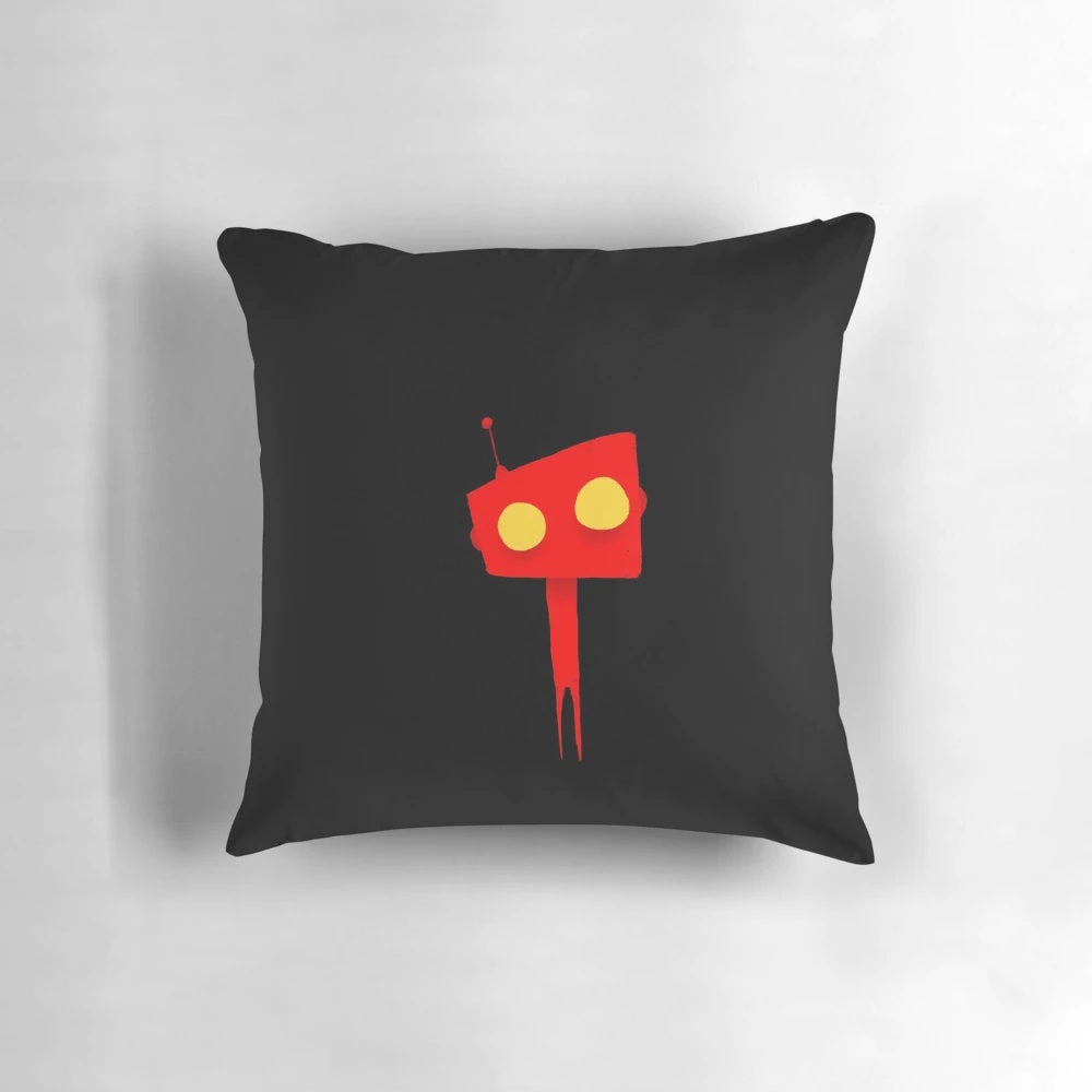 A small, red and yellow robotic-themed pillow with a flat, minimalist design.