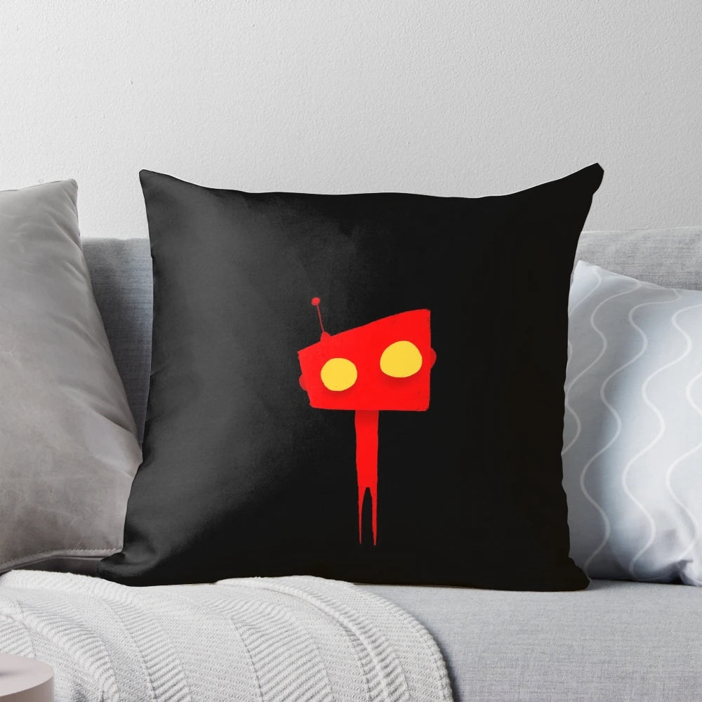 A small, red and yellow robotic-themed pillow with a flat, minimalist design.