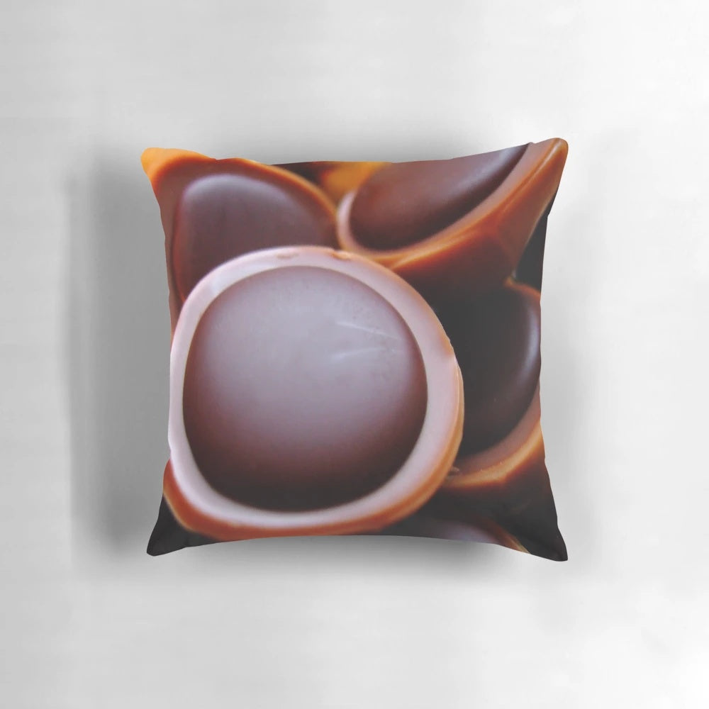 Toffifee-inspired abstract design pillow in blue and rose colors