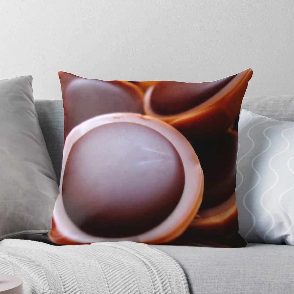 Toffifee-inspired abstract design pillow in blue and rose colors