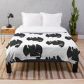 Toothless inspired plush blanket featuring the iconic Night Fury dragon from the How to Train Your Dragon movie franchise.