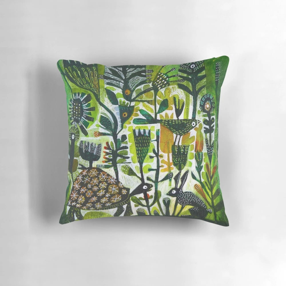 A decorative throw pillow featuring the classic fable of the tortoise and the hare.