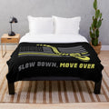 Tow truck operator plush blanket with "Slow Down Move Over" message