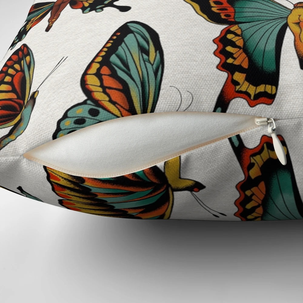 Decorative throw pillow featuring a traditional tattoo-style butterfly design
