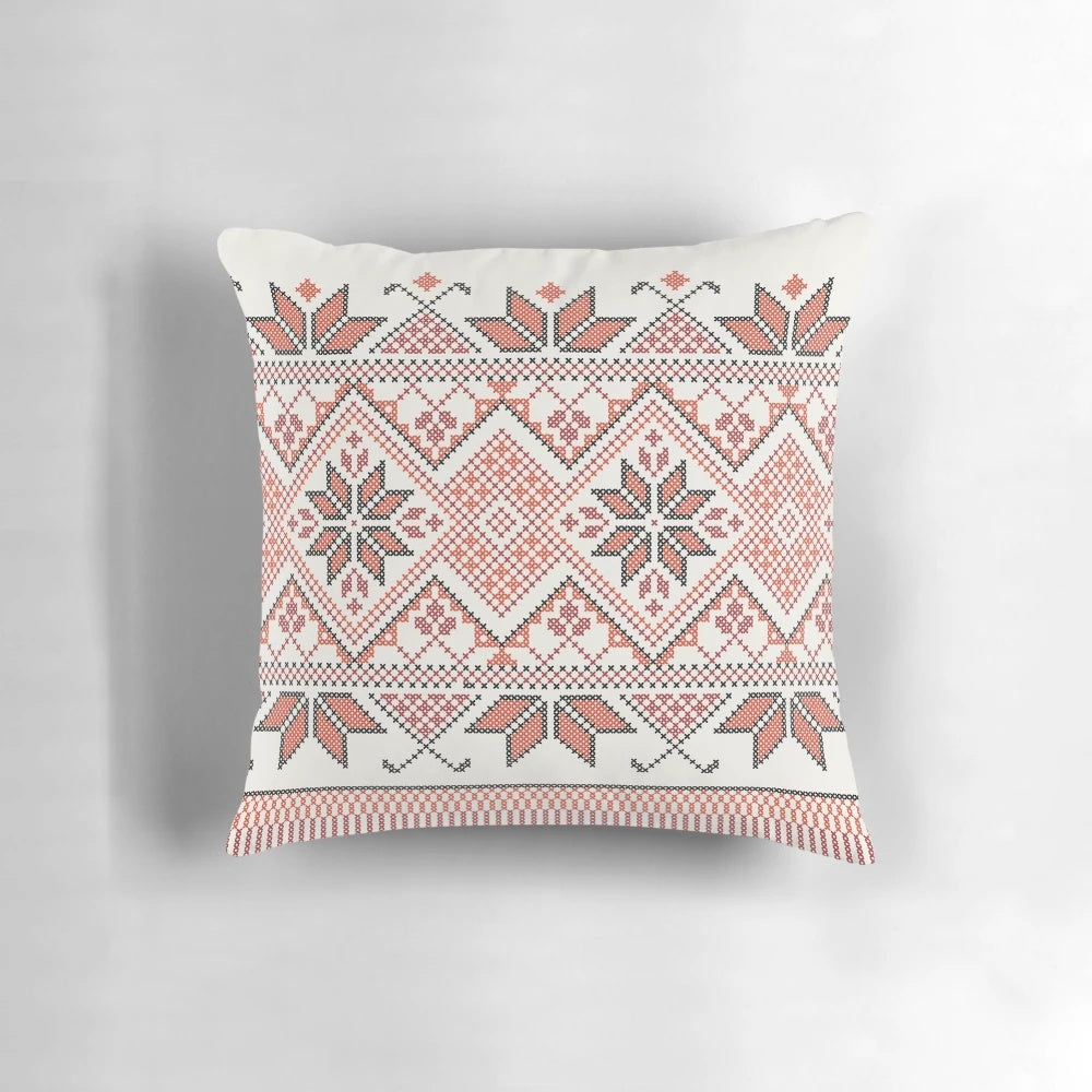 Handcrafted Palestinian Jordanian Tatreez embroidery pattern on a decorative throw pillow
