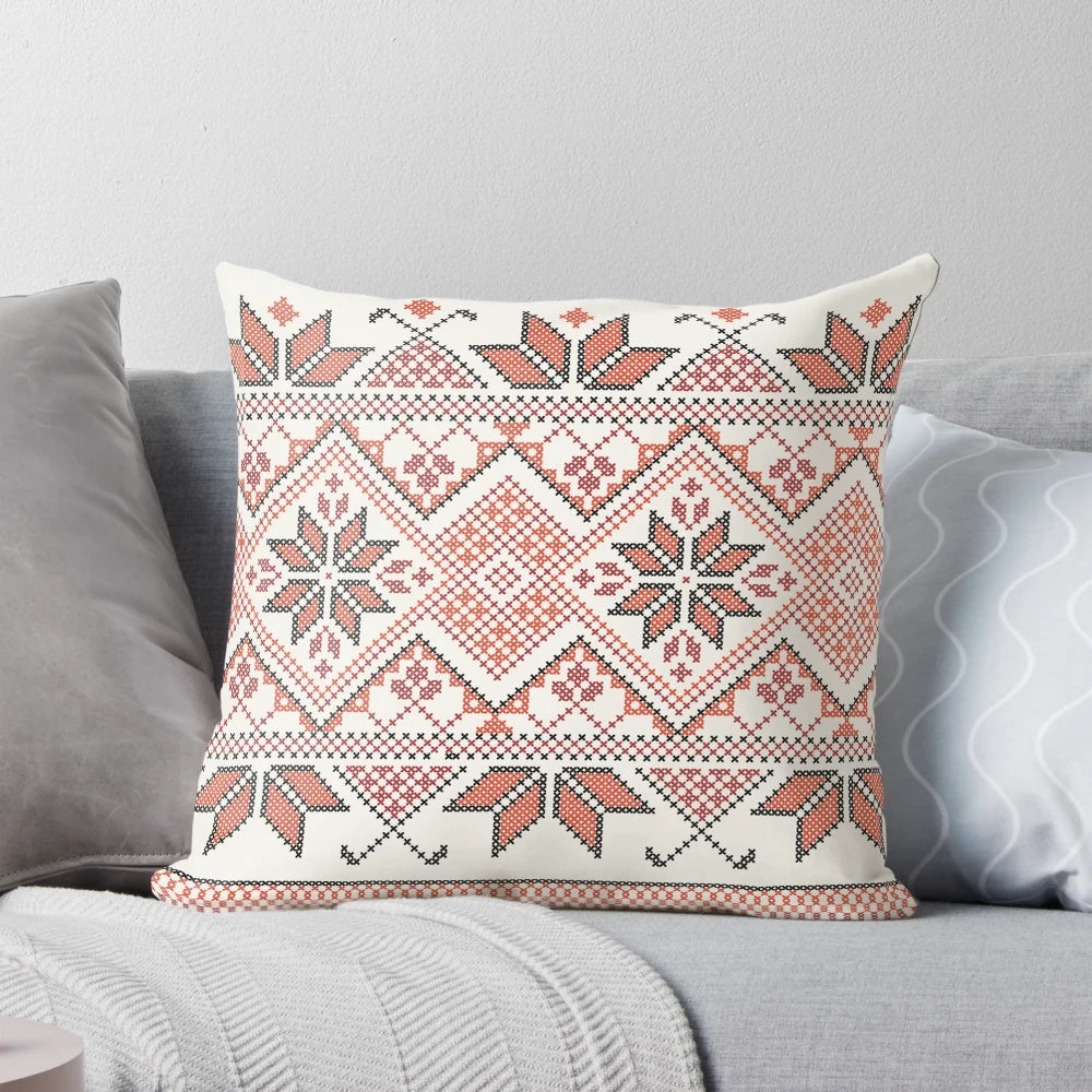 Handcrafted Palestinian Jordanian Tatreez embroidery pattern on a decorative throw pillow