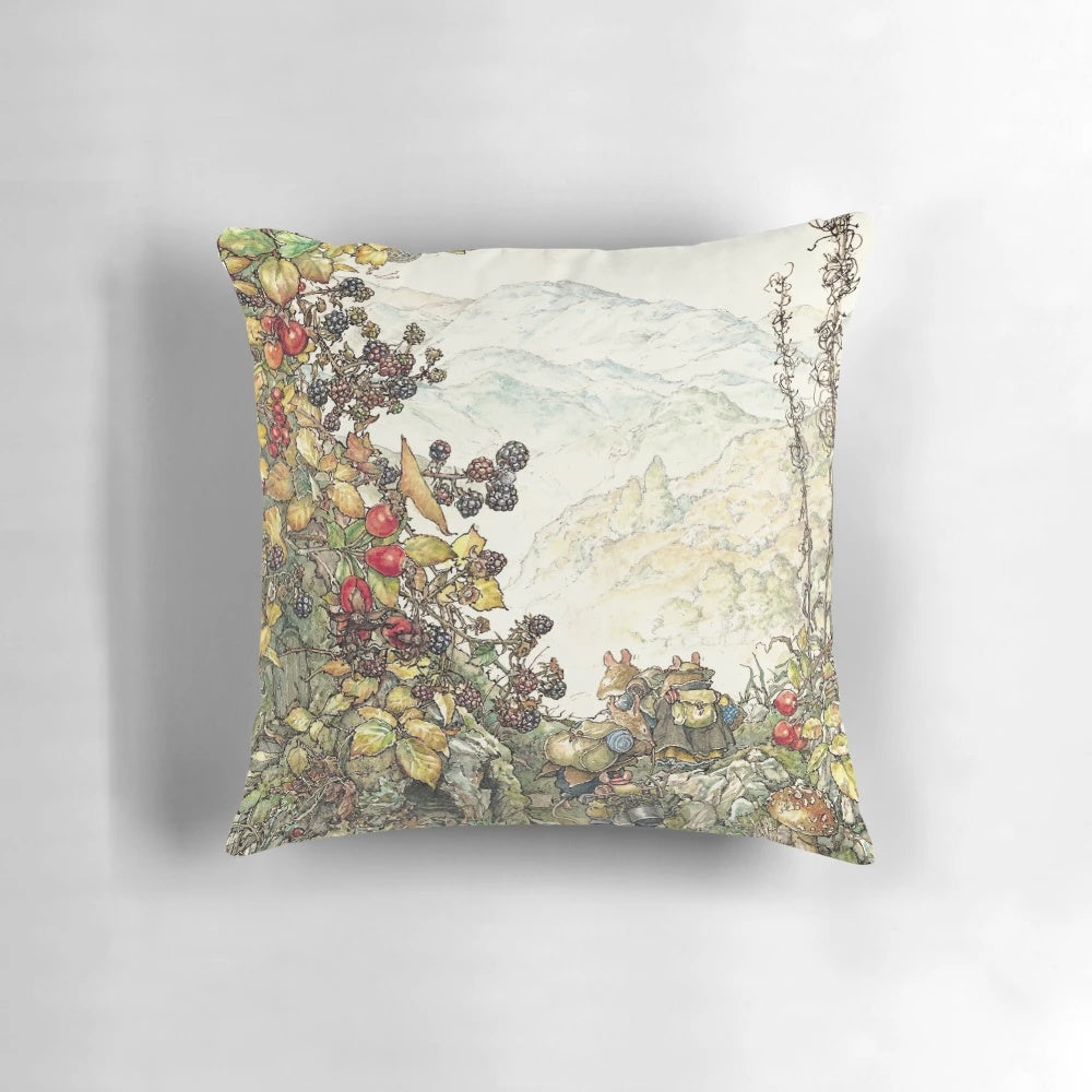 A plush, decorative pillow featuring a charming illustration of a pastoral British countryside scene with mice, flowers, and a hedgerow.