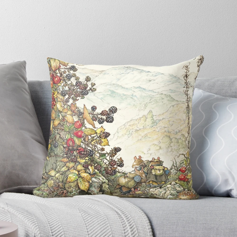 A plush, decorative pillow featuring a charming illustration of a pastoral British countryside scene with mice, flowers, and a hedgerow.