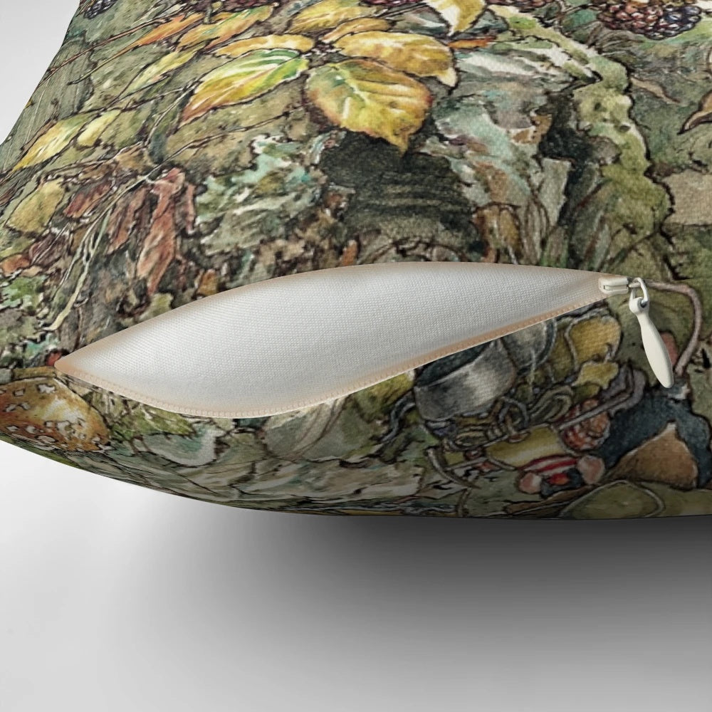 A plush, decorative pillow featuring a charming illustration of a pastoral British countryside scene with mice, flowers, and a hedgerow.