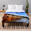 Cozy plush blanket featuring a serene empty beach landscape