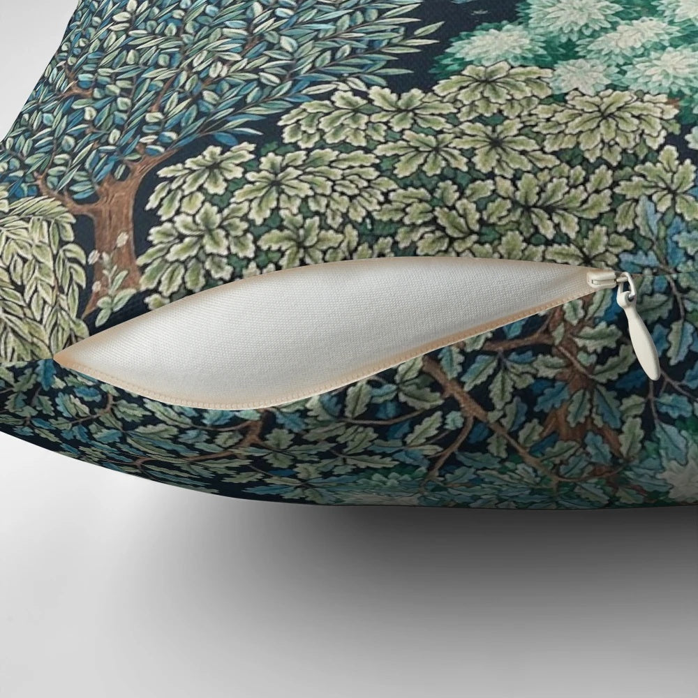 A beautiful floral pillow featuring a serene scene of deer by a brook in a verdant forest setting.