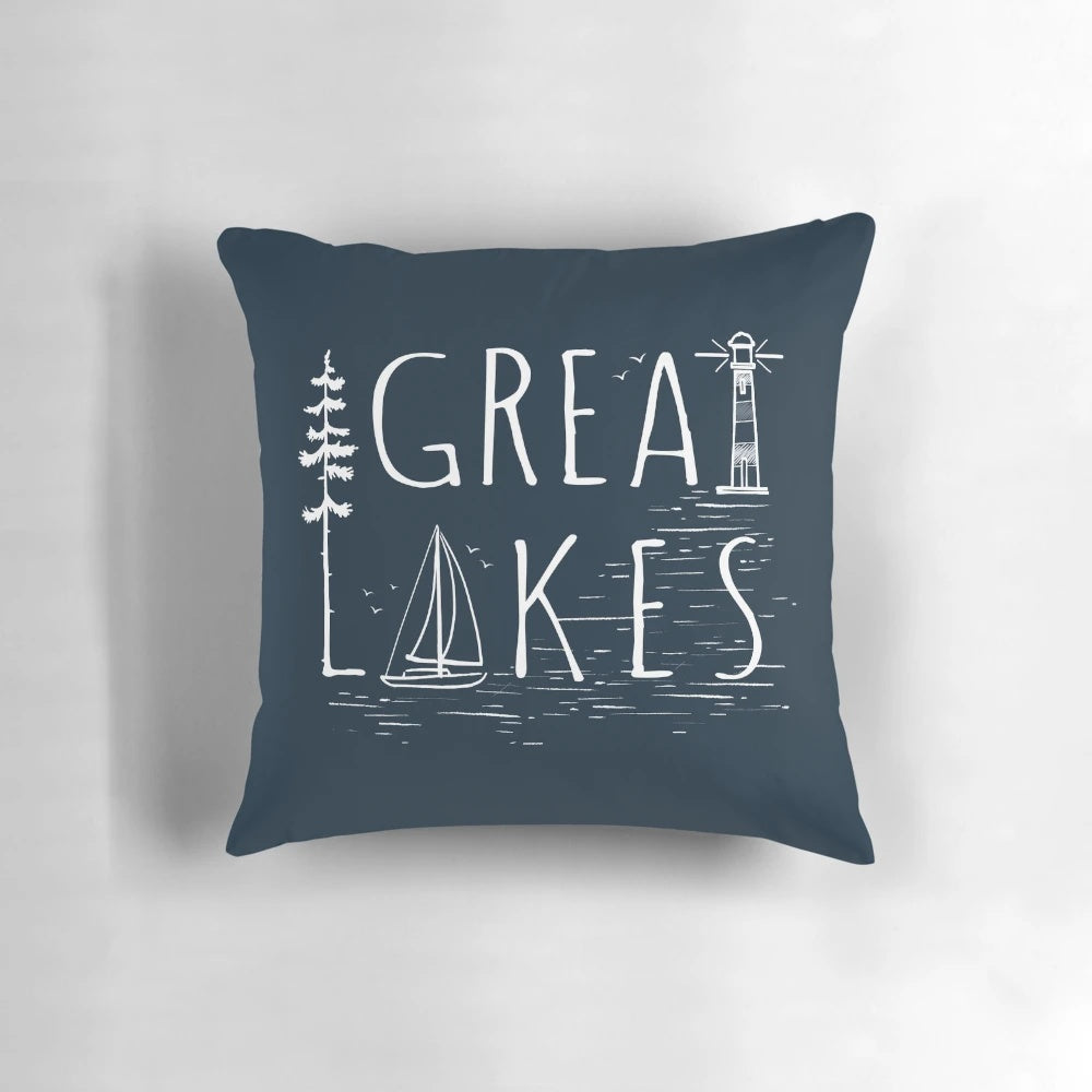 Cozy, nautical-inspired Great Lakes pillow with sailboat and lighthouse design