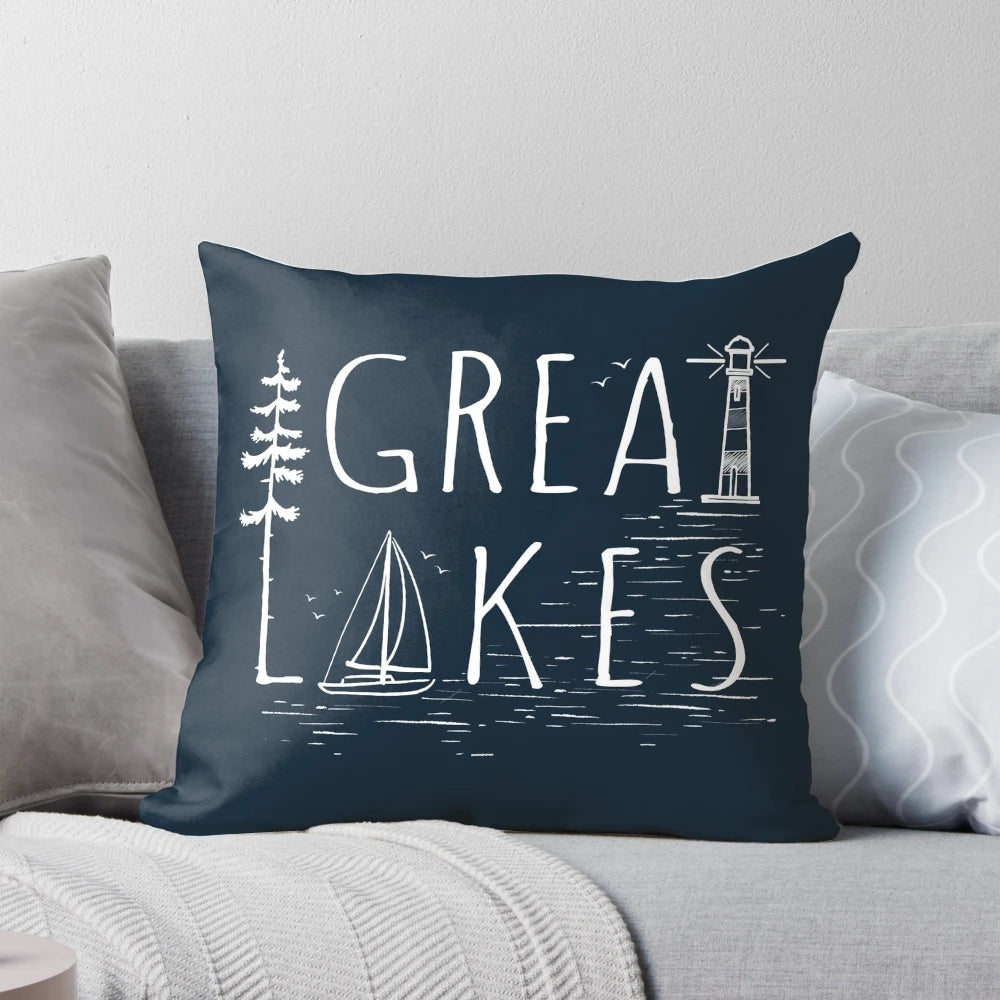 Cozy, nautical-inspired Great Lakes pillow with sailboat and lighthouse design