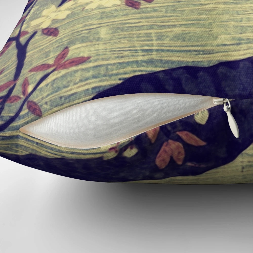 A decorative pillow featuring a serene Japanese landscape with Mount Fuji, a mountain lake, and delicate flowers.