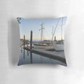 Pillow featuring a peaceful morning scene on the Johnstone River in Innisfail, Far North Queensland, with moored boats and wooden structures.