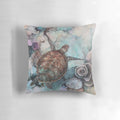 Decorative pillow featuring a vibrant illustration of a turtle swimming among a coral reef