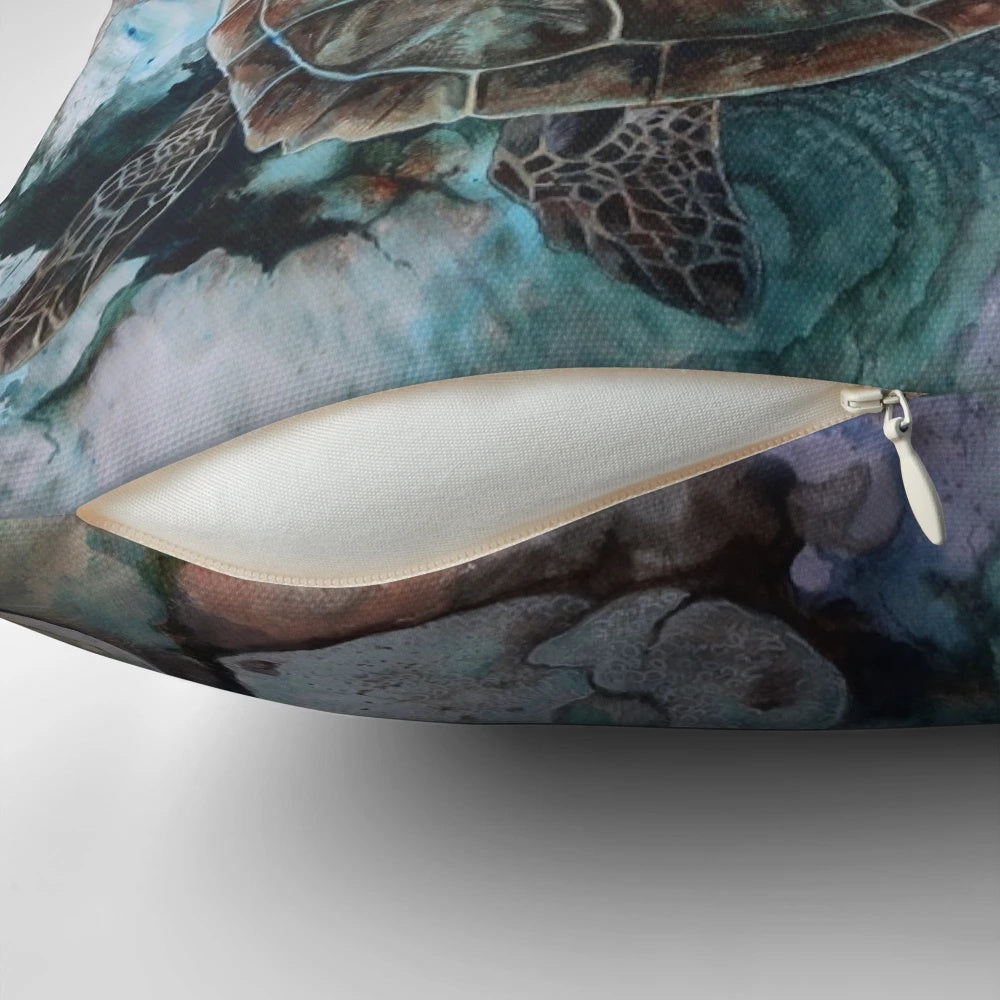 Decorative pillow featuring a vibrant illustration of a turtle swimming among a coral reef
