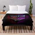Transformers-inspired plush blanket featuring Autobots and Decepticons