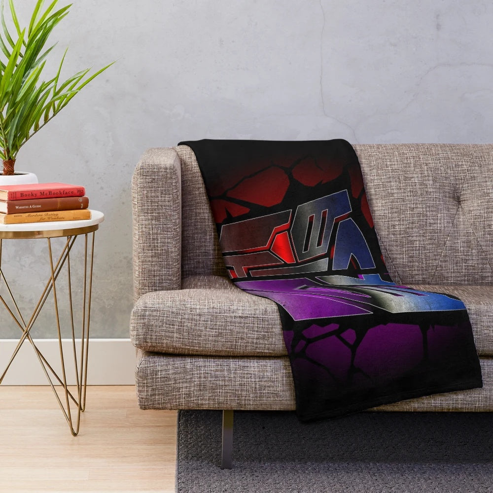 Transformers-inspired plush blanket featuring Autobots and Decepticons