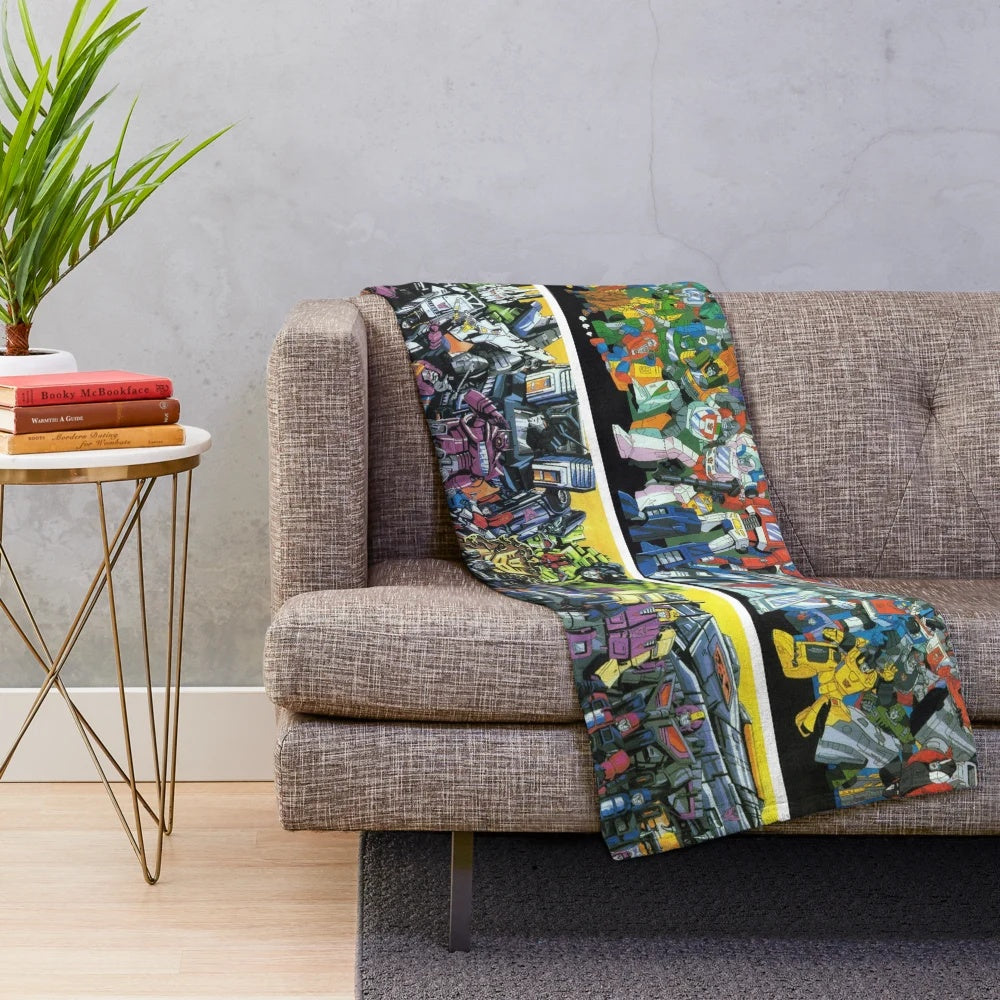 Transformers-inspired plush blanket featuring Cybertrons and Destrons