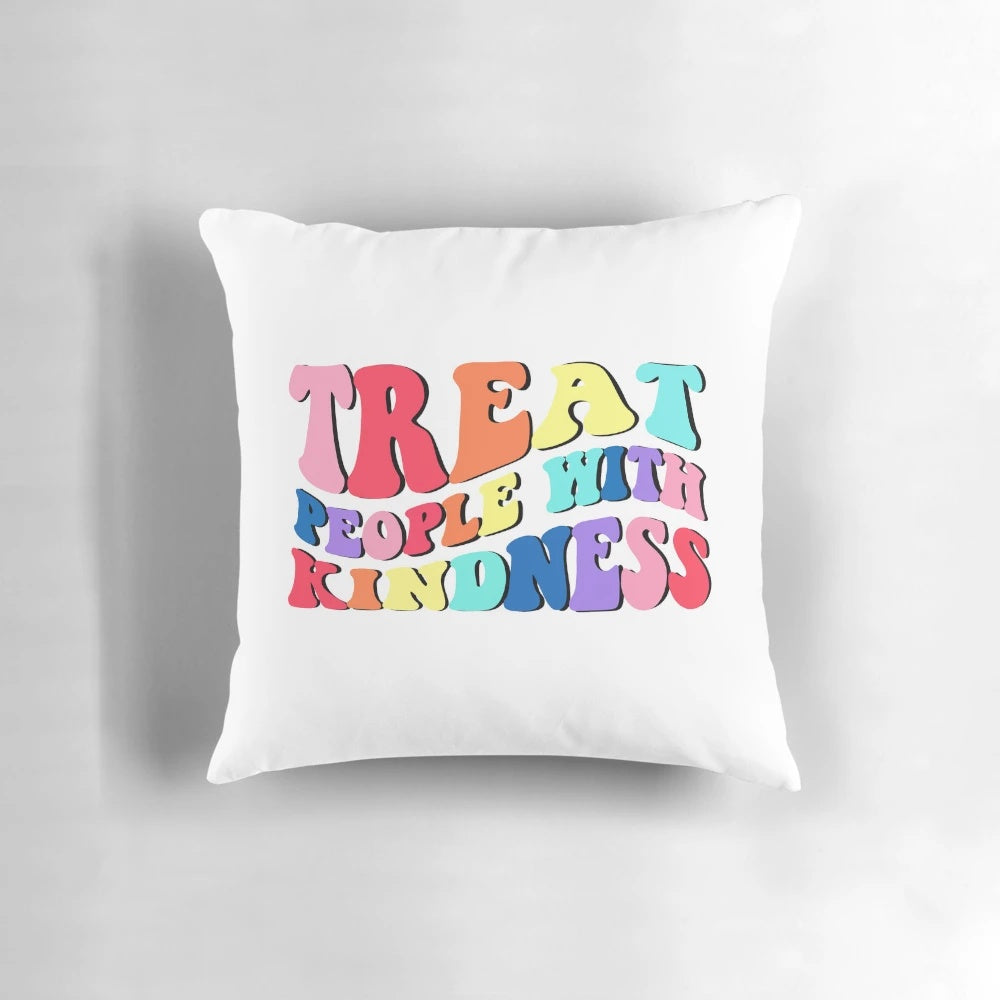 A soft, cozy pillow featuring the text "Treat People With Kindness", inspired by Harry Styles' message of kindness.