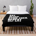 Star Trek inspired plush blanket with "Eat Sleep Star Trek Repeat" design