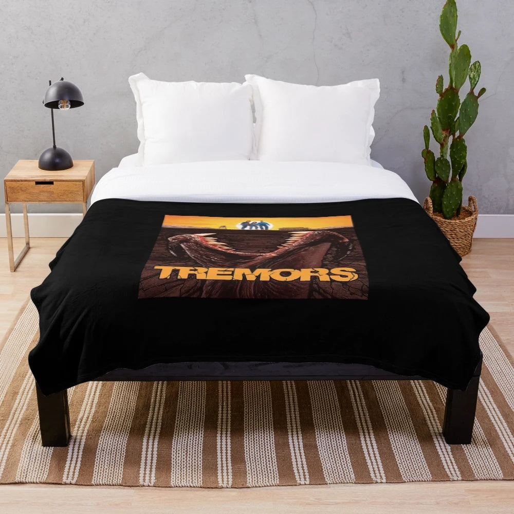 Tremors inspired plush blanket featuring minimalist movie poster design