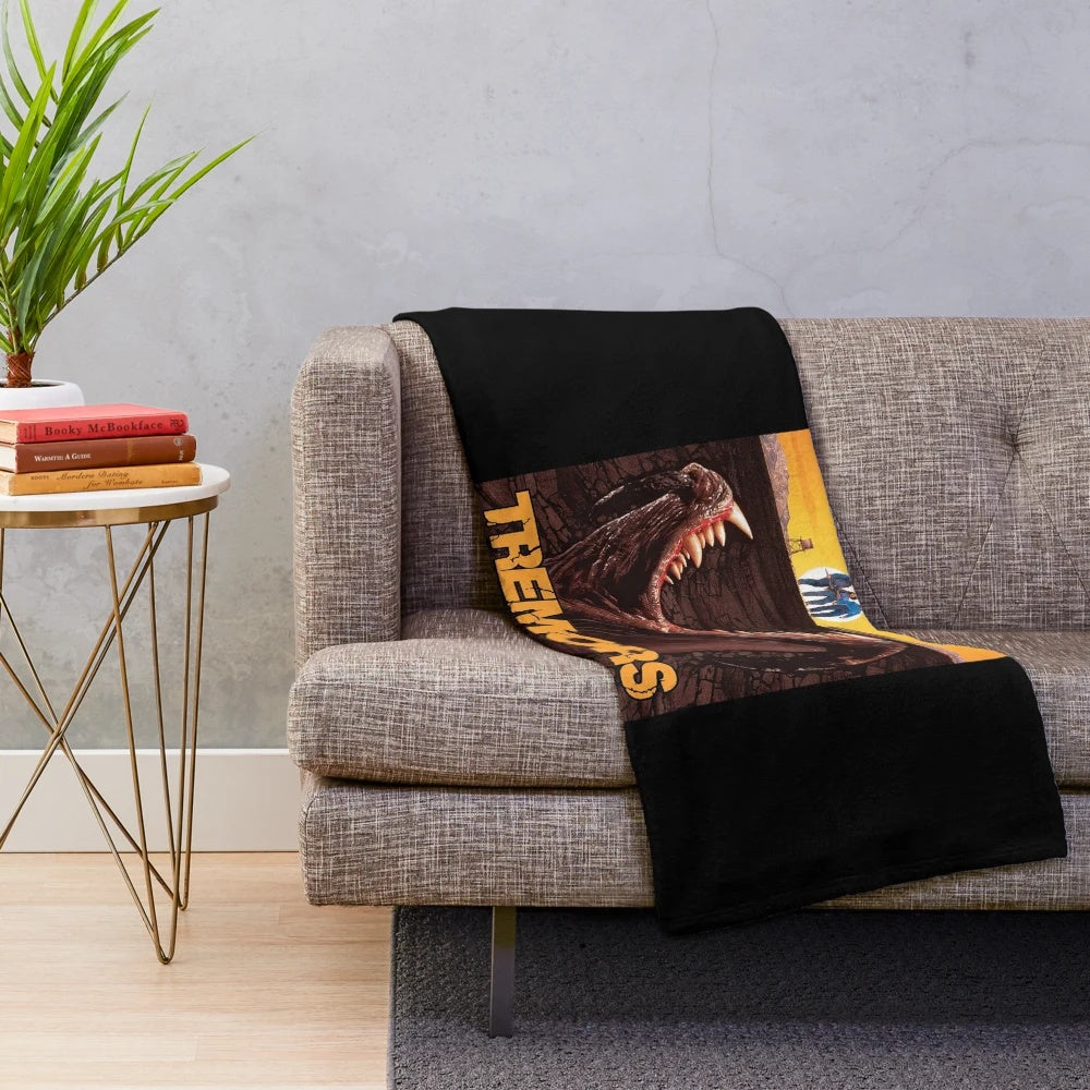 Tremors inspired plush blanket featuring minimalist movie poster design