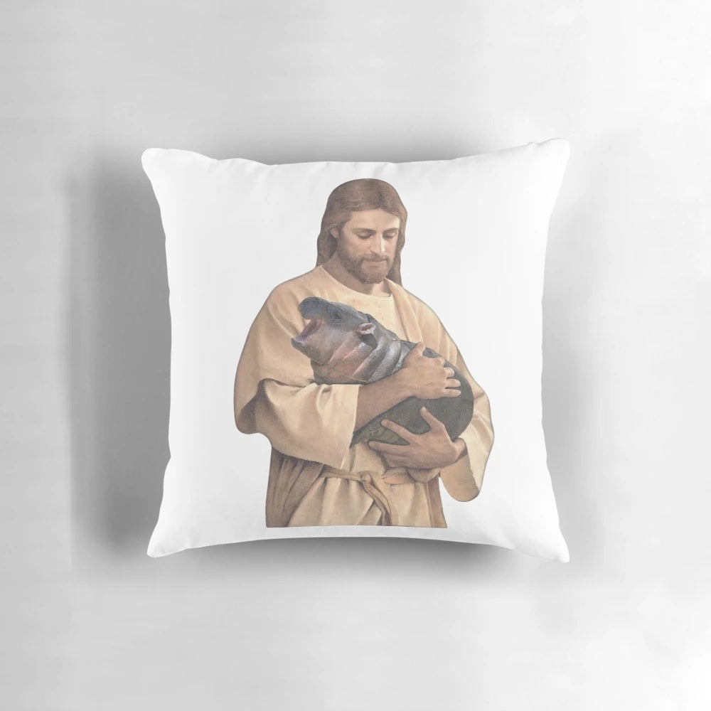 A soft, plush pillow featuring the popular "Jesus Moo Deng" meme with a baby hippo