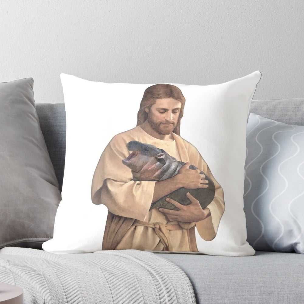 A soft, plush pillow featuring the popular "Jesus Moo Deng" meme with a baby hippo